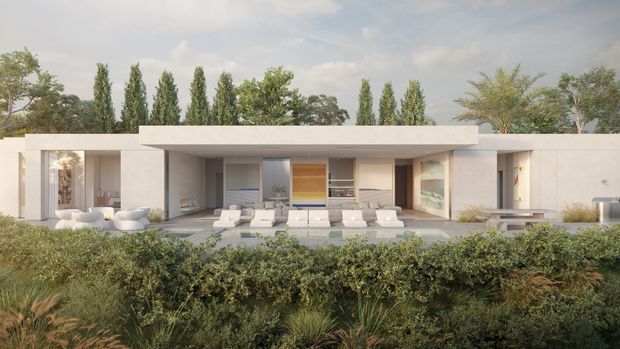 A wide architectural rendering of a low, single-storey modern residence set behind landscaped hedges. The home features a long flat roof, crisp white rendered walls, extensive floor-to-ceiling glazing, a deep covered outdoor living area, and a central open-plan living space with pale lounge furniture. Tall slender trees and layered planting frame the building.