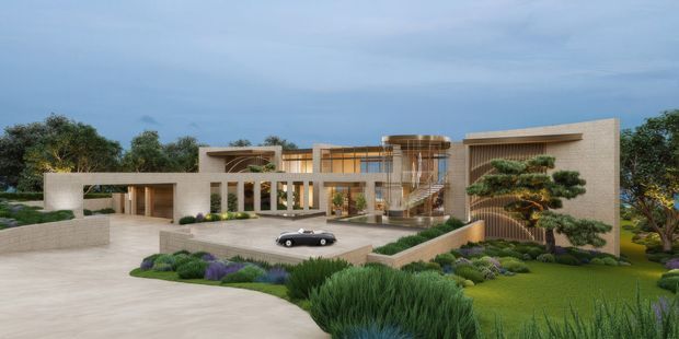 A high-end contemporary residence viewed from the landscaped driveway, featuring pale masonry walls, extensive glazing, a flat roofline, a central glazed entry or courtyard volume, and a sculptural exterior staircase. The broad forecourt is surrounded by layered ornamental planting, clipped trees, lawn, and curved garden beds under an overcast blue-grey sky.