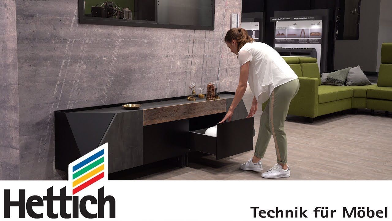 Sculptural home aesthetics! Dark designer sideboard | Hettich