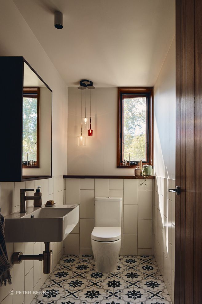 The timber, aside from its classic aesthetic appeal, brings warmth, tactility and human scale to the home.