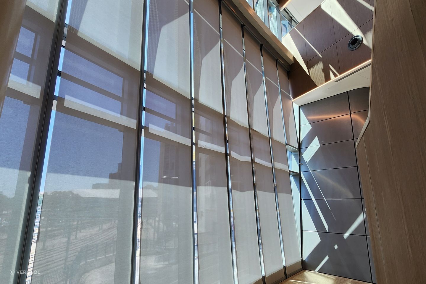 For the void area, a heavy-duty blind system was needed that could operate effectively with an 8-metre drop.