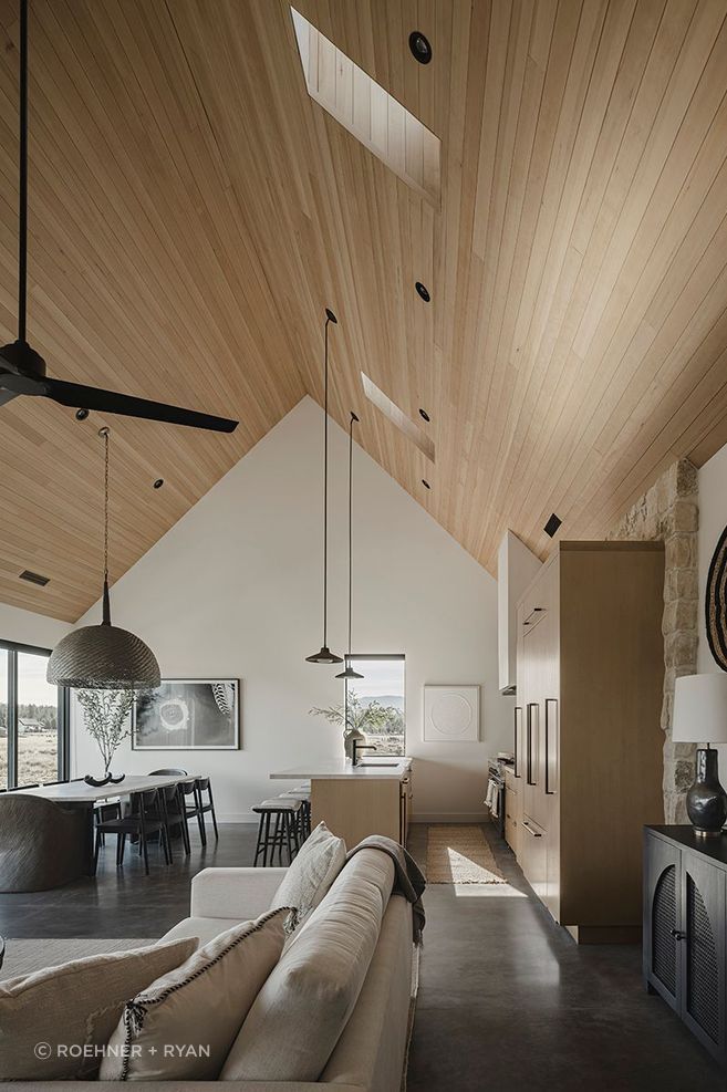 For Noir Peaks, The Ranch Mine's clients wanted a home that would serve as a refuge in the high-altitude volcanic landscape of Flagstaff, Arizona, offering a place to rest, recover, and reflect between outdoor adventures. They sought a design inspired by both the rugged natural environment and the Danish concept of Hygge, prioritizing warmth, comfort, and simplicity.