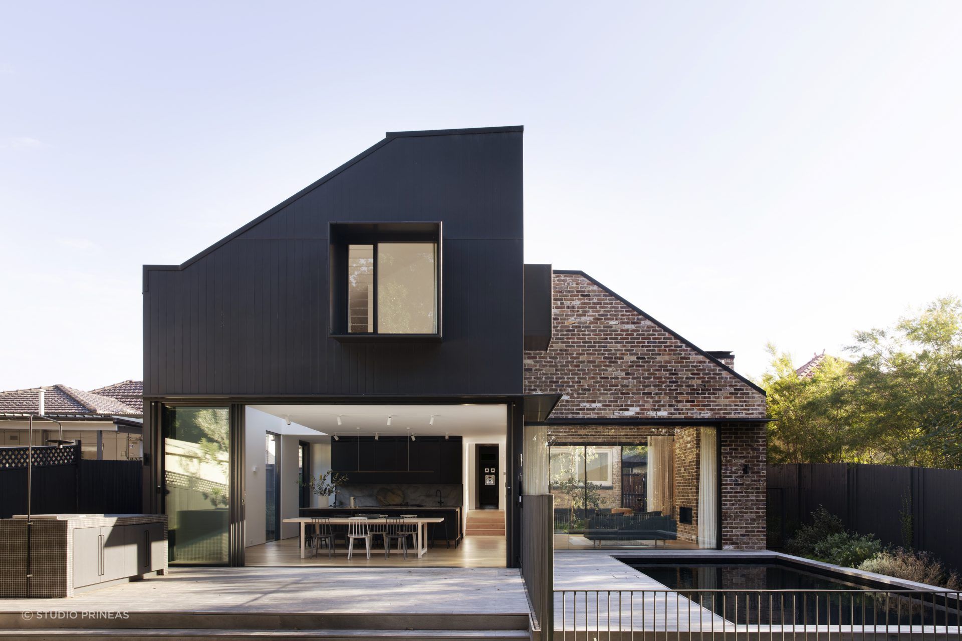 The brick cladding and dark timber of Cnr Virginia work so well as complementary choices - Photography: Chris Warnes