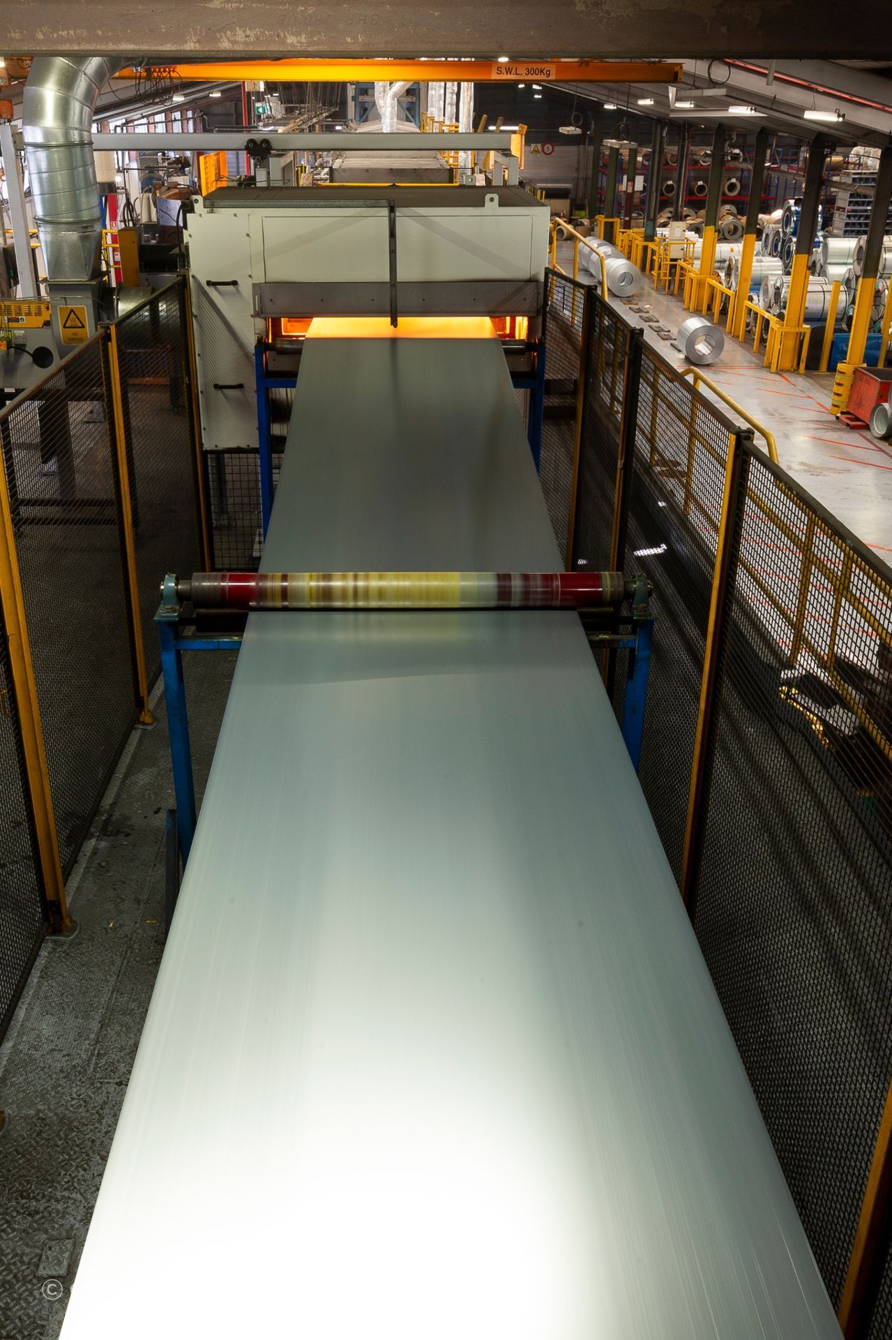 Steel going through the pre-treatment process via
ColorCote’s infrared ovens.