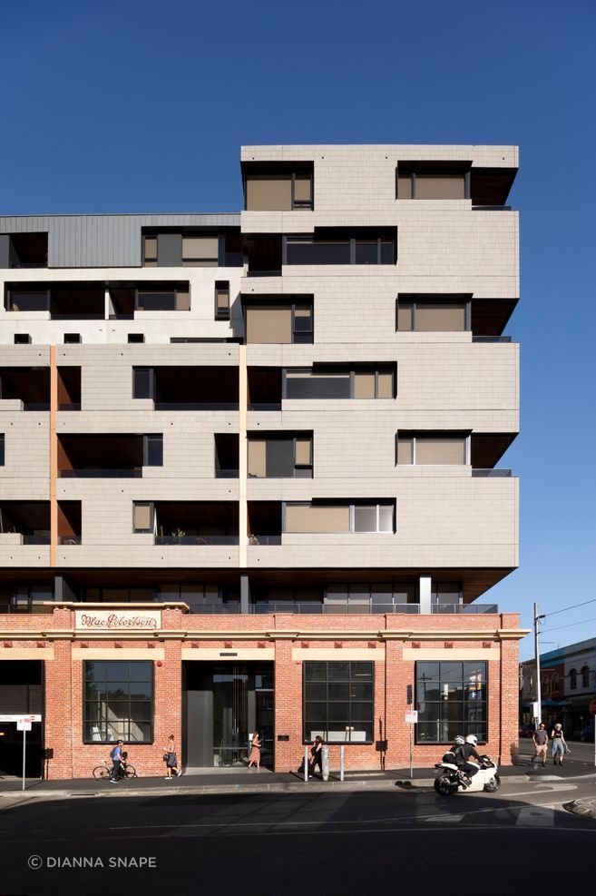 The Lyric’s Brick Inlay façade of ash grey tiles pays homage to Fitzroy’s industrial character.