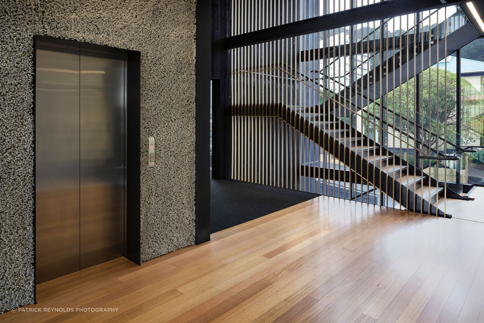 Nick Radford wool rugs applied to the lift frontage at the Royal Society of New Zealand.
