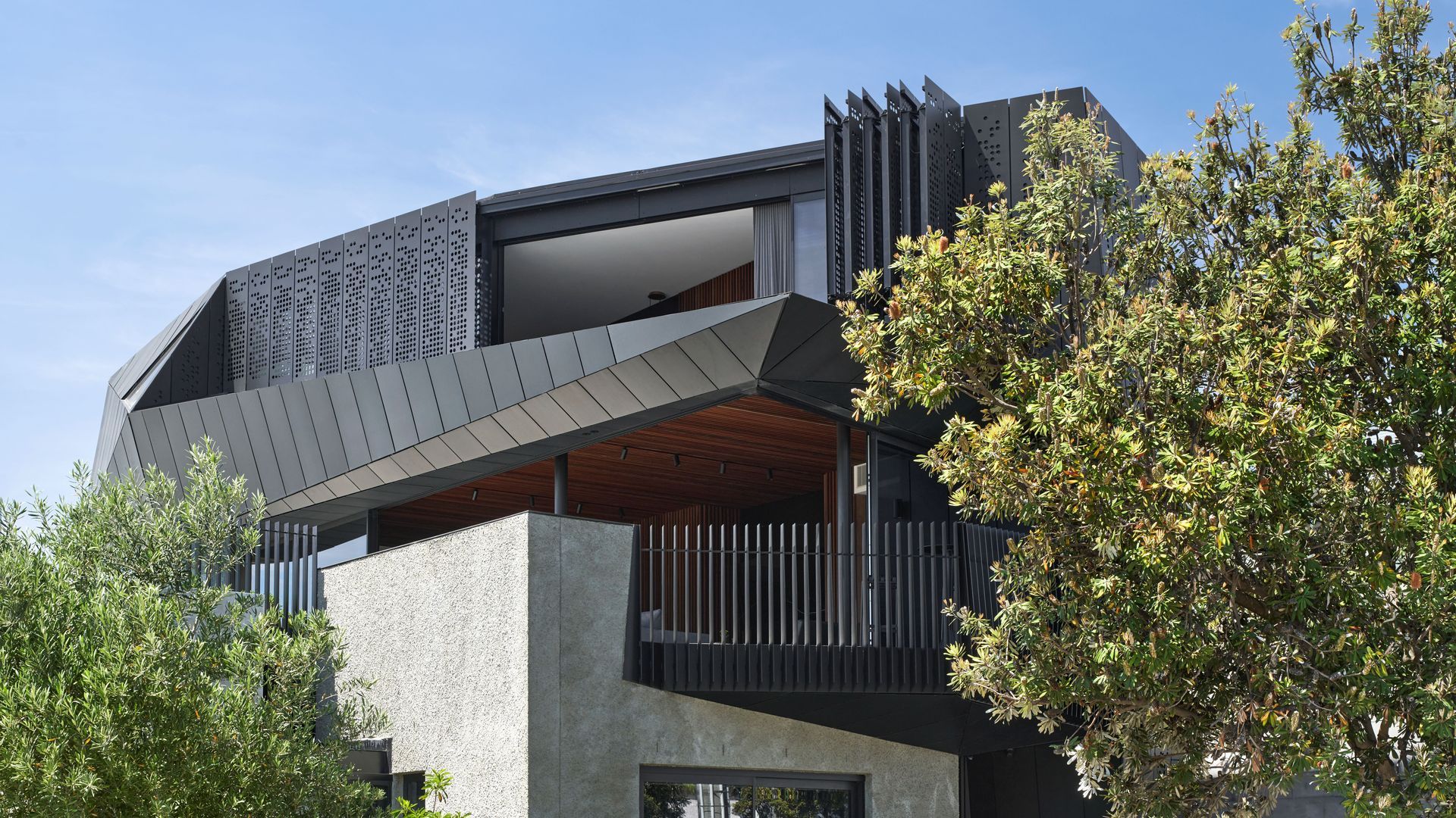 Harold features custom motorised perforated anodised aluminium panels from Shade Factor.  video