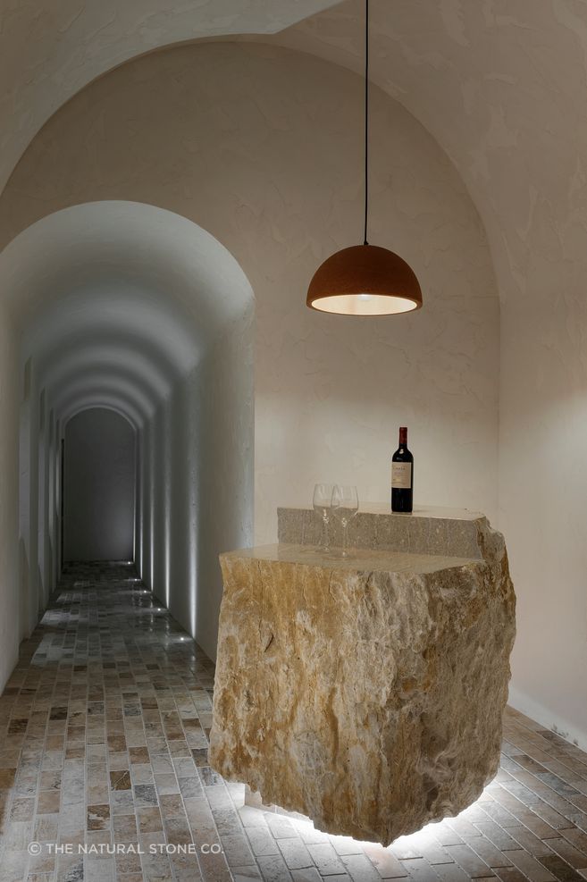 Carved from Te Kūiti Cream limestone, this wine cellar plinth reflects The Natural Stone Co.’s ability to shape local stone into highly specific, atmospheric interior moments.