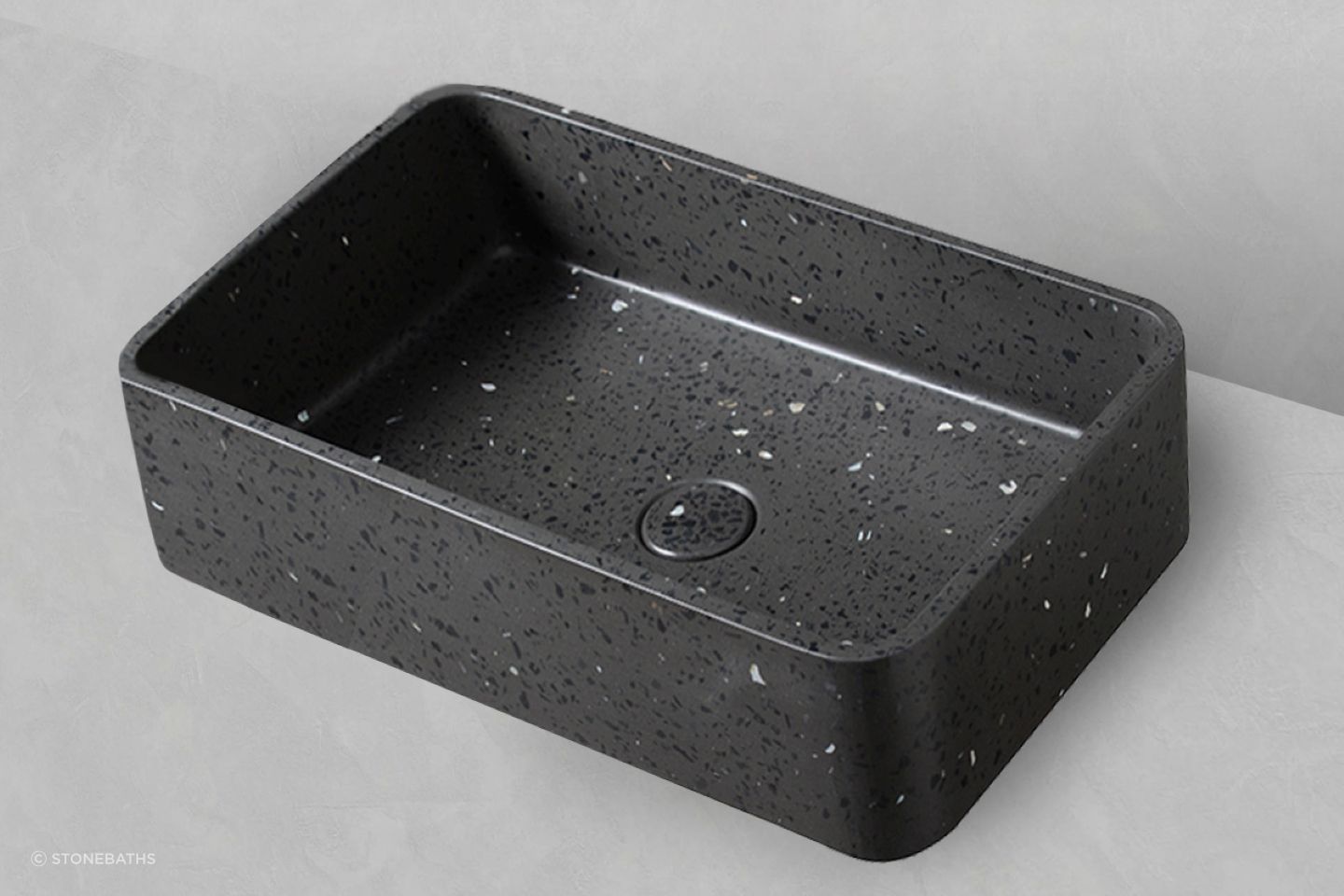 The undeniable classy quality of black concrete and terrazzo stone comes to the fore with the Black Terrazzo Basin.