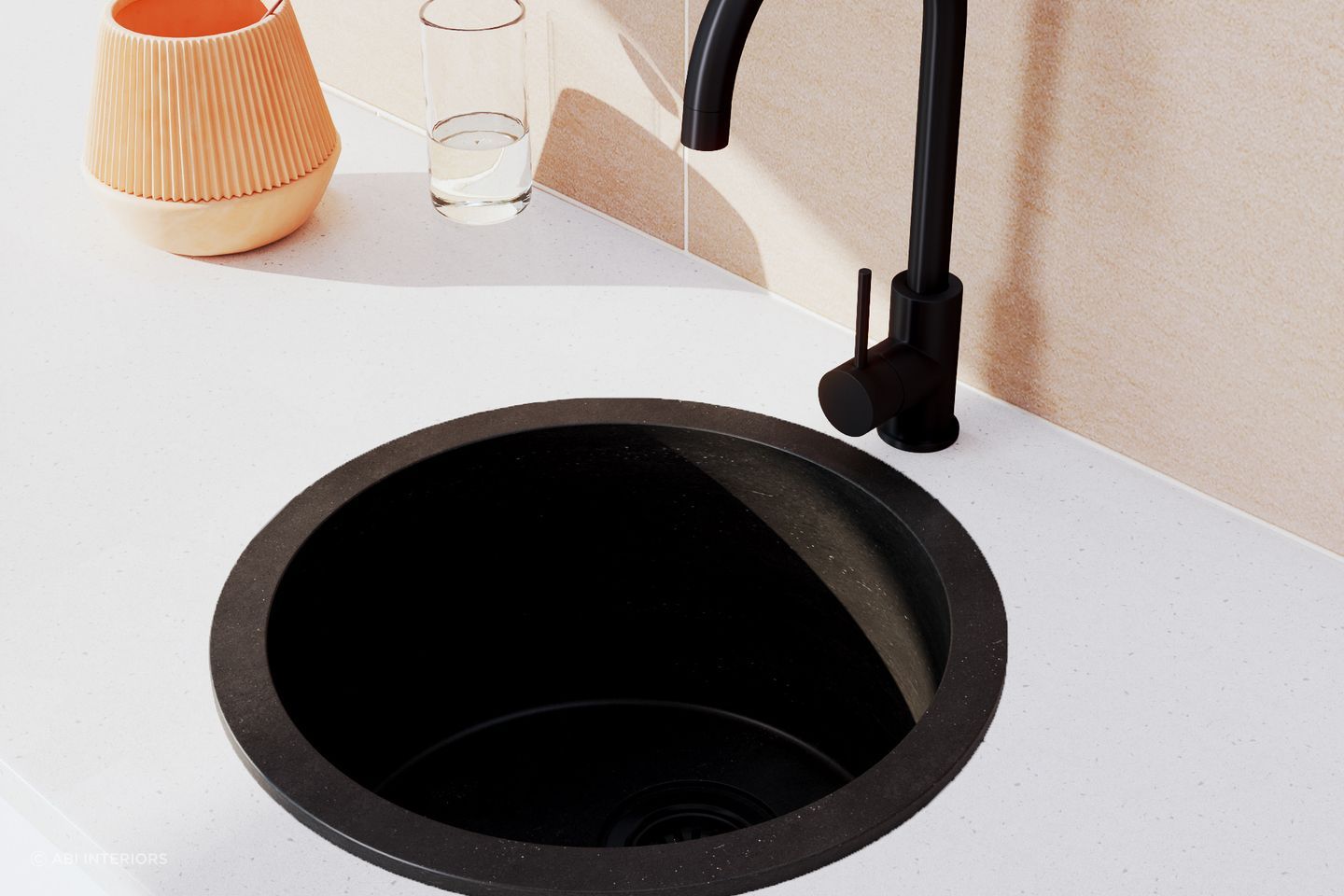 The ABI Vera Round Sink in Black Granite is a compact and versatile bathroom sink with subtle textural qualities.