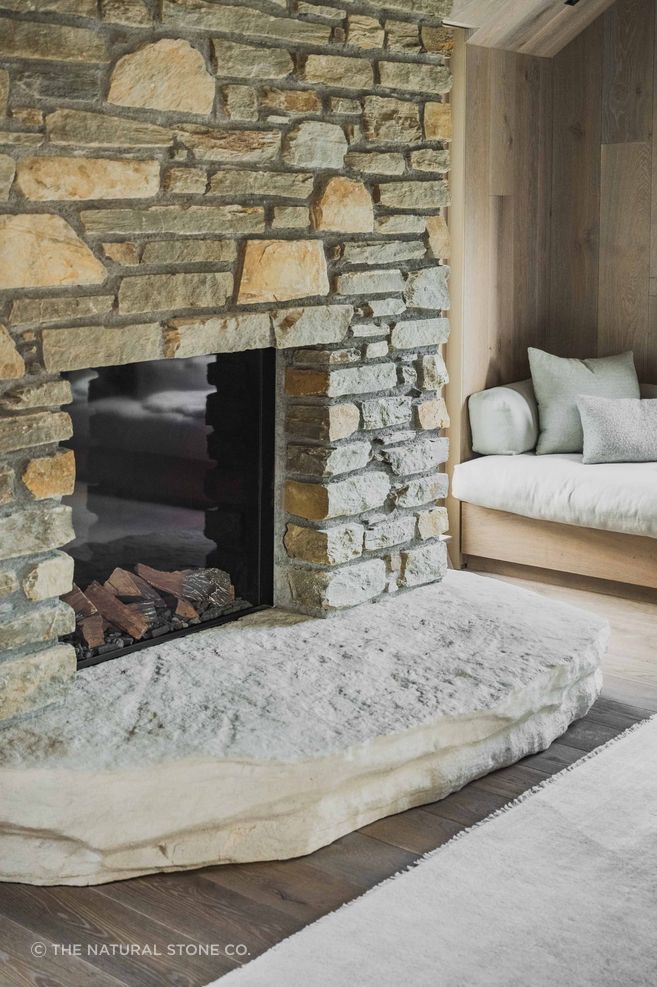 Local schist paired with a NZ limestone hearth – by The Natural Stone Co.