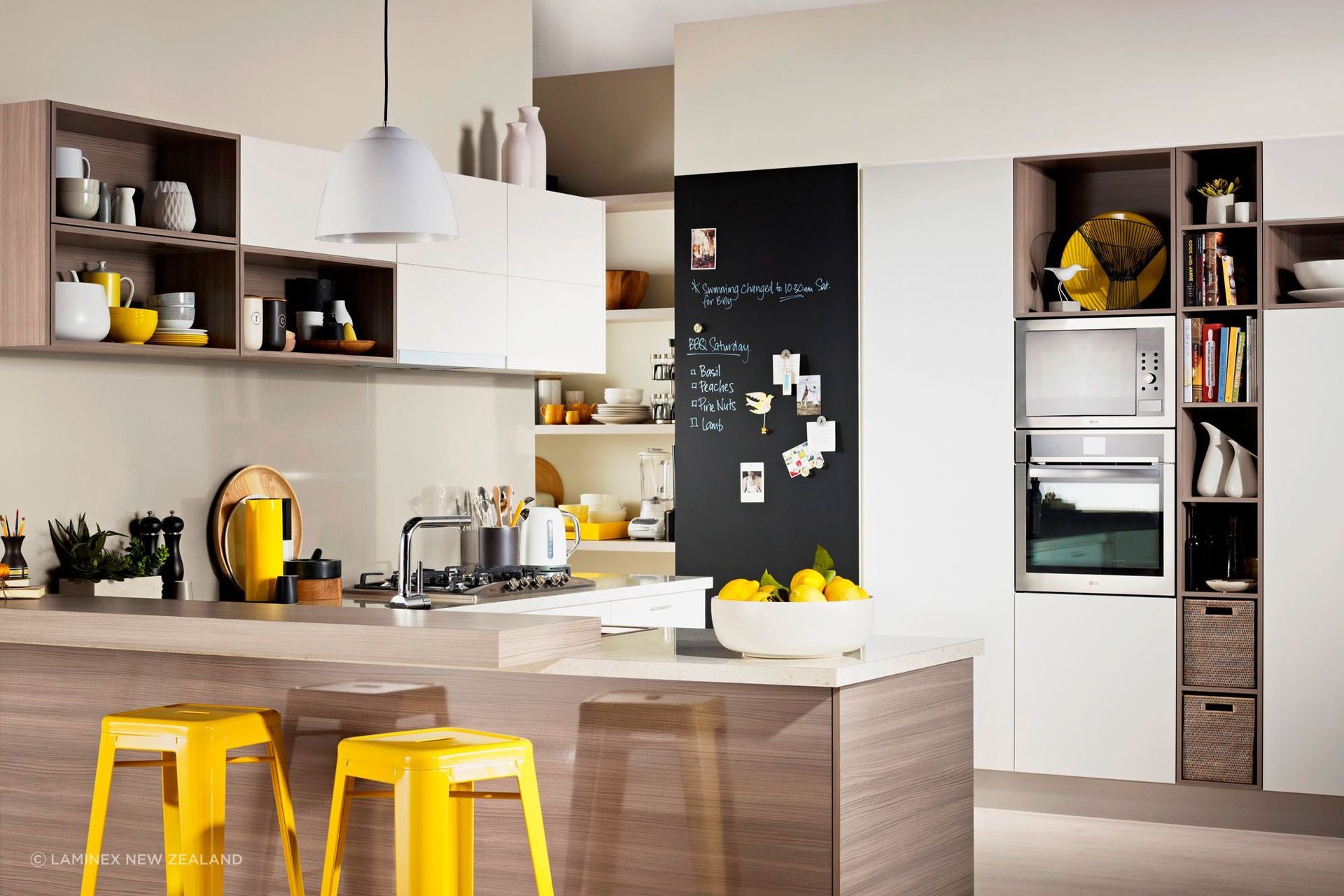 Find places to show your kids' work, like these magnetic writable surfaces from Laminex.