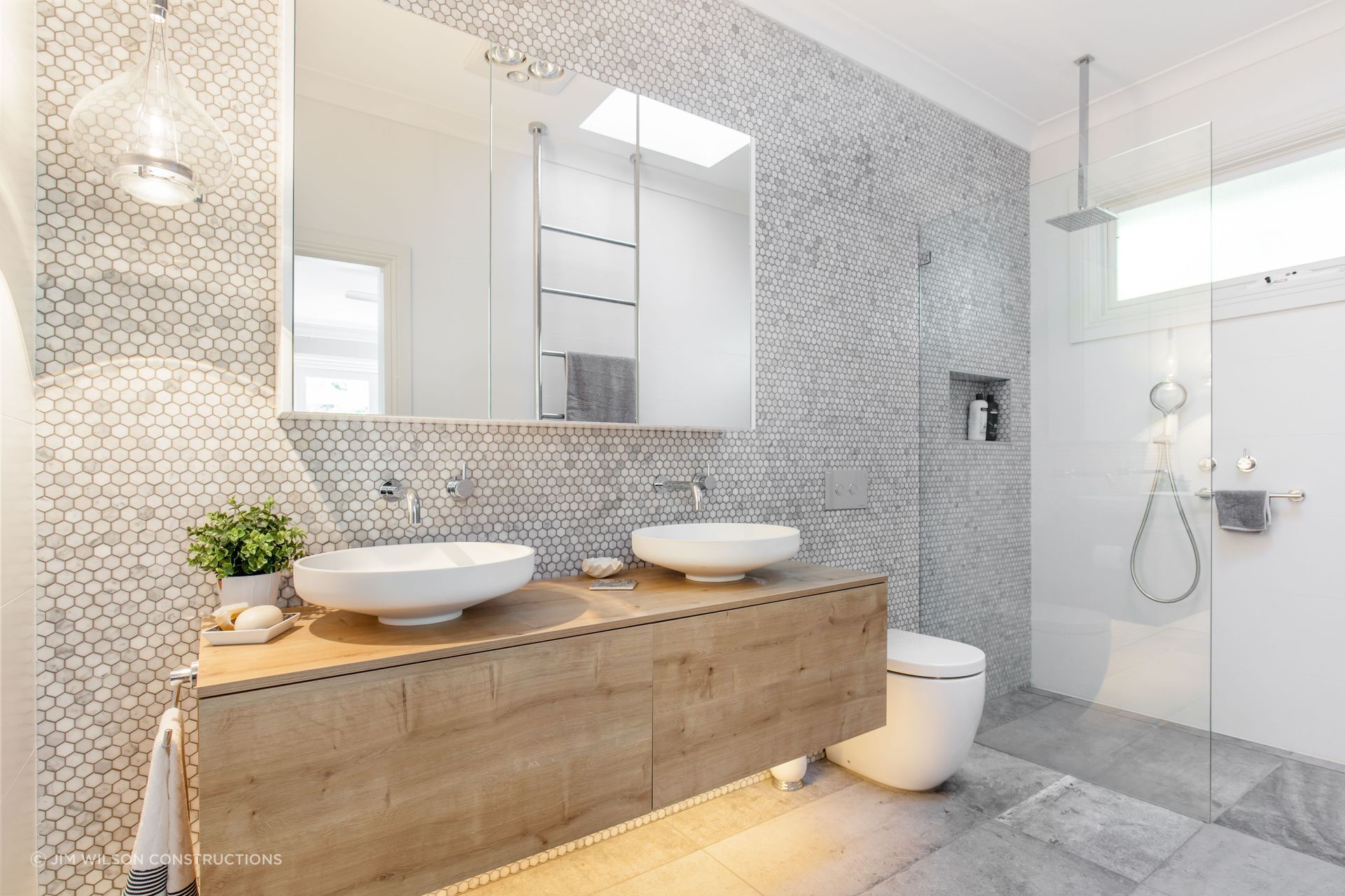 A perfectly sized shower screen enhances the look of a shower space.