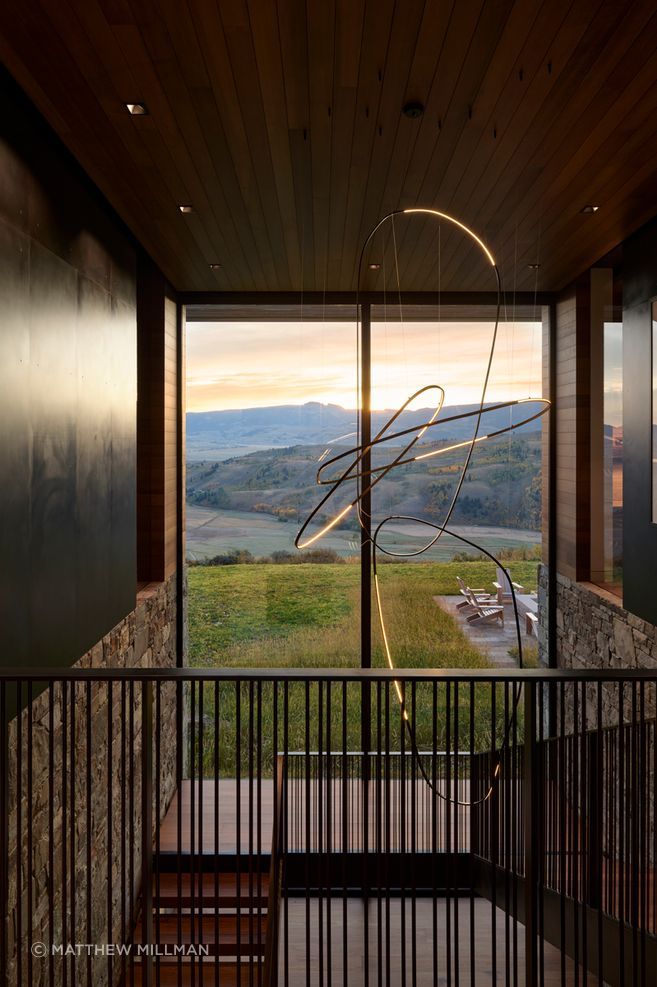 At Skyview, stone, timber and blackened steel frame the transition between interior and landscape, giving the home a material language that feels grounded, tactile and deeply connected to its mountain setting.

Architecture: CLB Architects