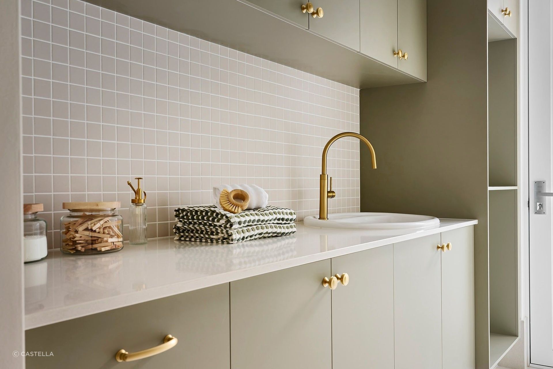 Laundry Renovation Featuring Castella Decade Dome Knob in Satin Brass
