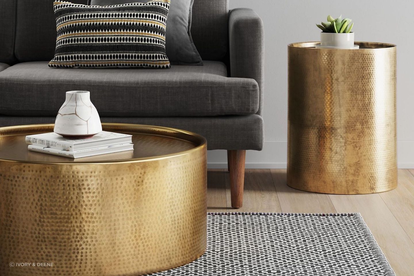 This intricately hammered barrel coffee table showcases a distinctive and elegant design.