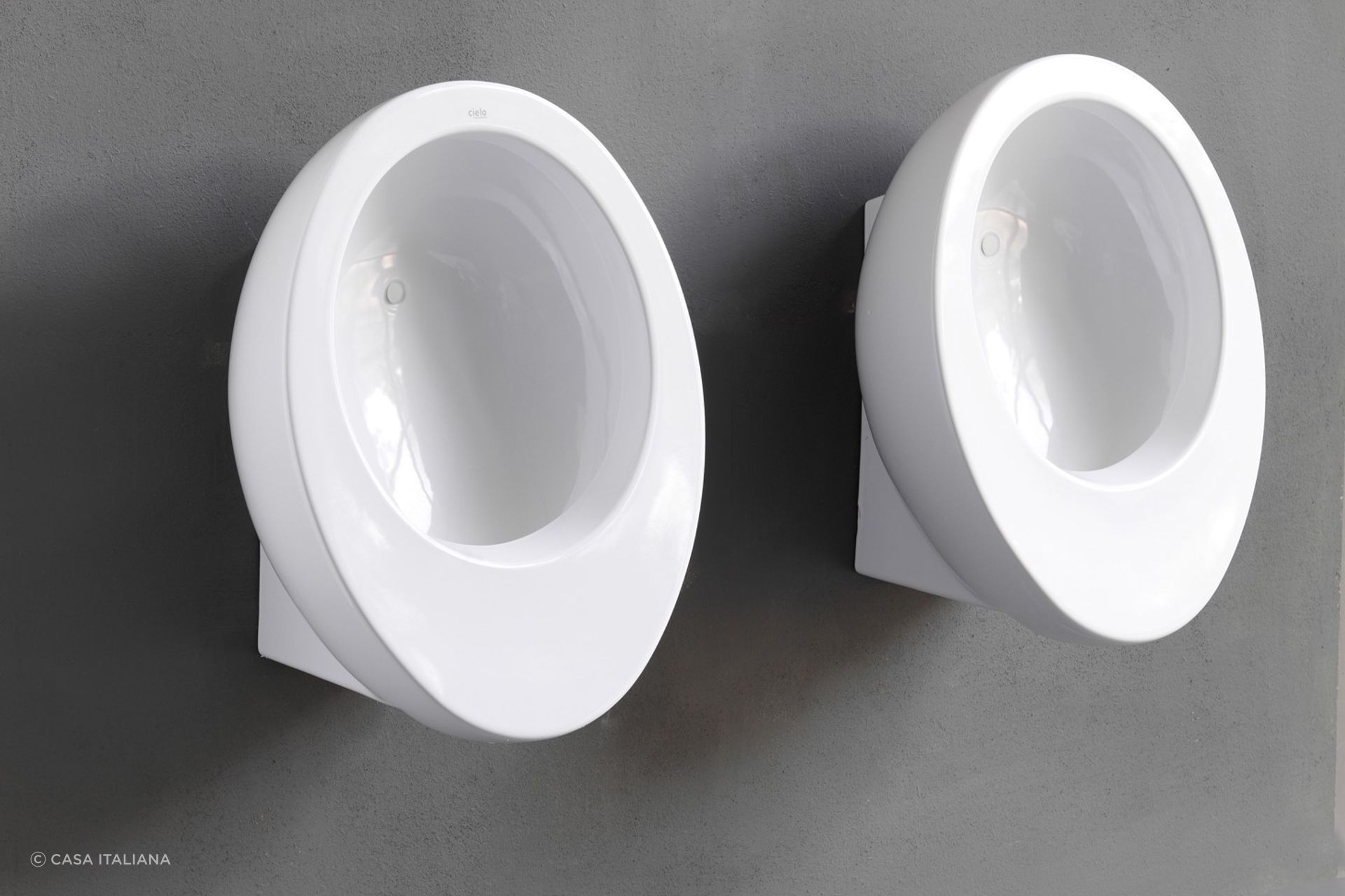 The elegant, sinuous design of the Le Giare Wall Hung Urinal by Cielo shows how stylish these solutions have become.
