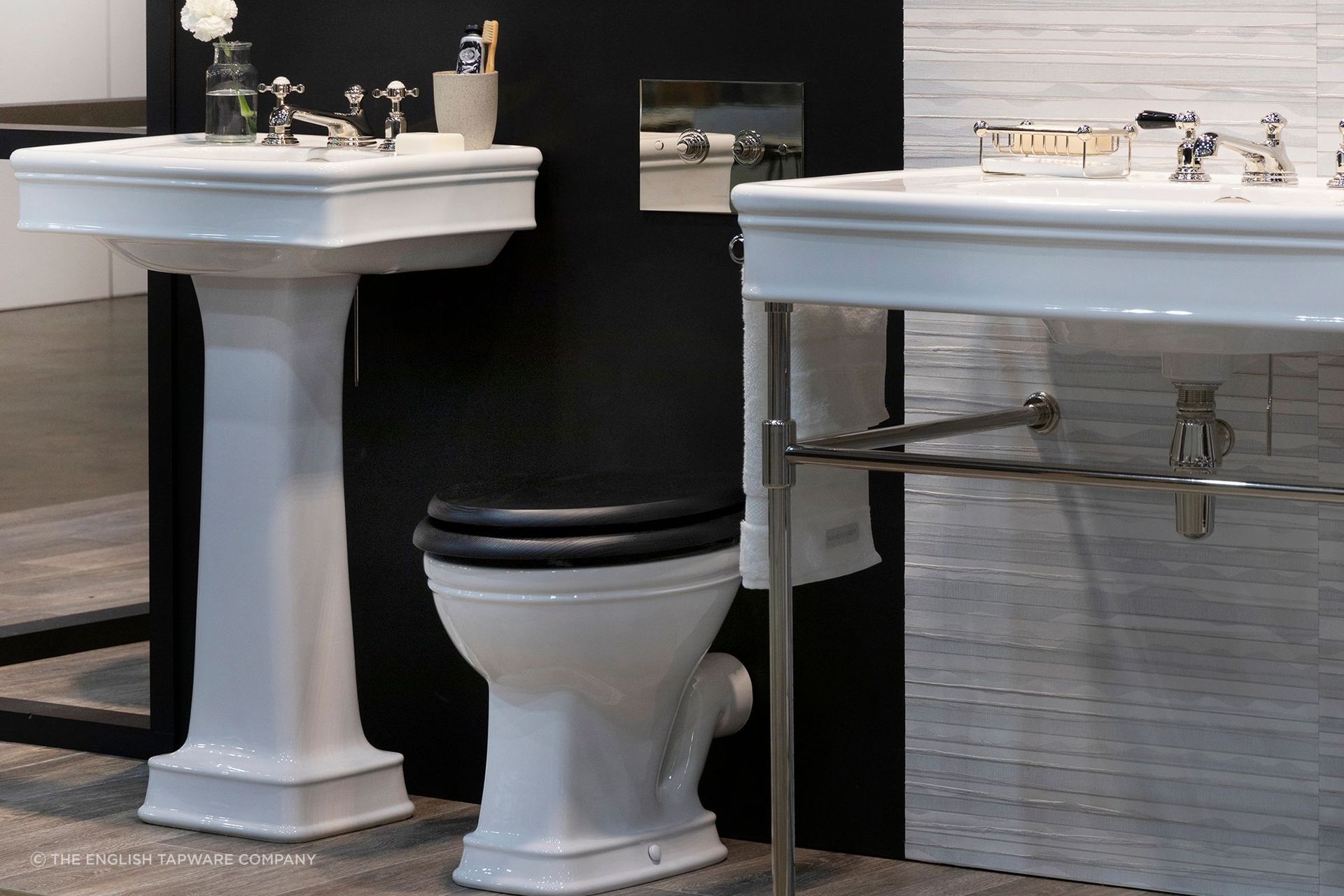 A modern toilet with two flush buttons, one for a full flush and another for a half flush, providing users with water-saving options