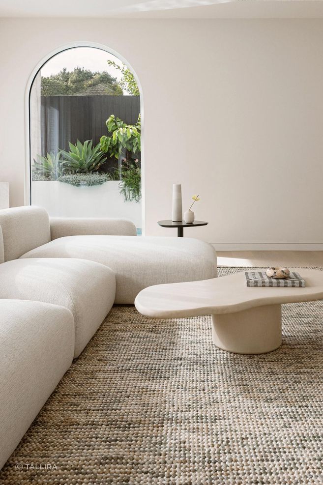 Magic Rug in Autumn Green featured with Muundo Laini Coffee Table in Stone