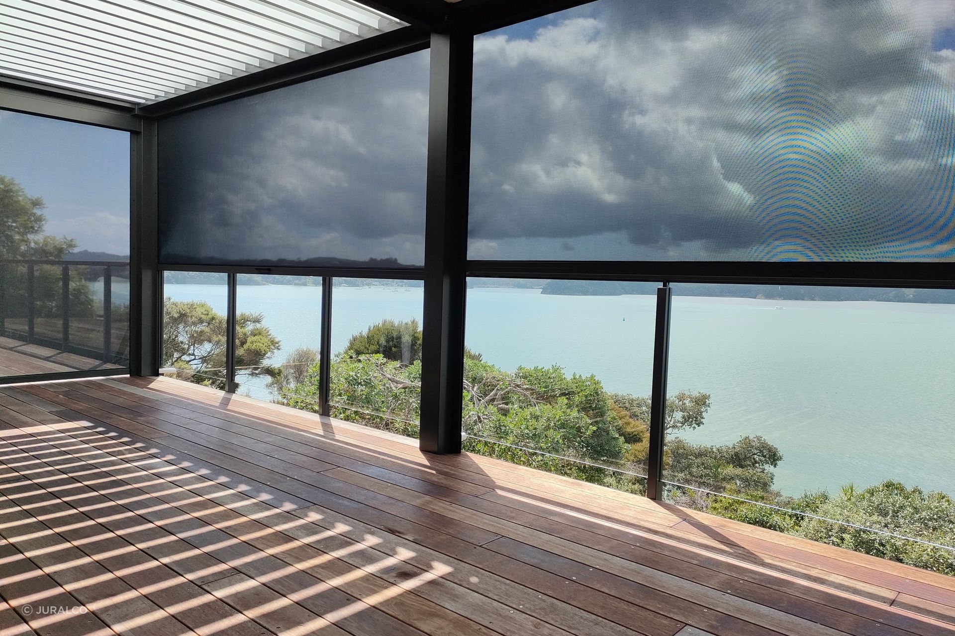 By following a thorough process, you'll ensure you pick the right outdoor blinds for your space, seen here with the Solarzip® Outdoor Blinds
from Juralco.