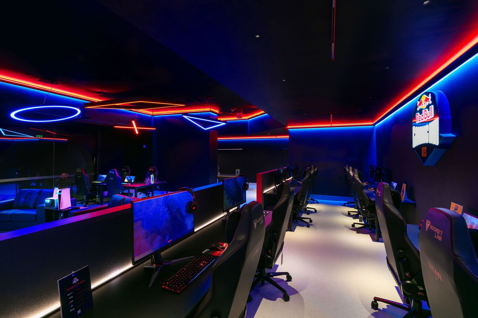 Above and below: UTS Red Bull gaming lounge; using gamer controller buttons lighting pendants were created to hang from the ceiling in their shapes: circle, X, and triangles. RGB colours were used to mimic the Red Bull logo.