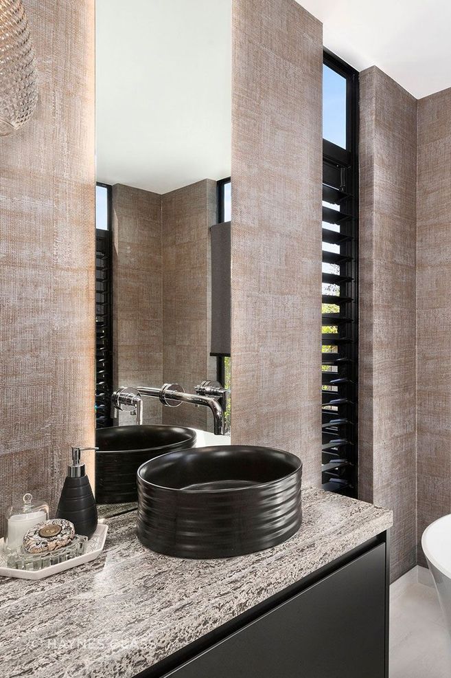 The LED backlight trend is a great way to add soft lighting to any bathroom.