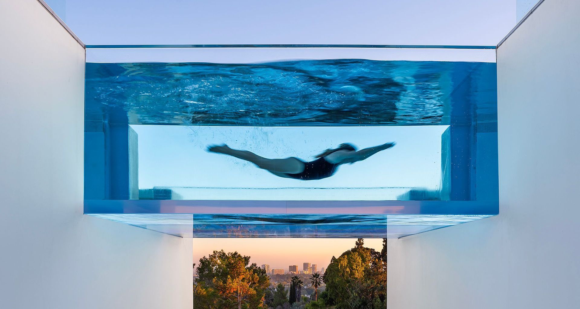 Water, light and view converge in a McClean Design home, where an acrylic pool transforms the experience of moving through the architecture.