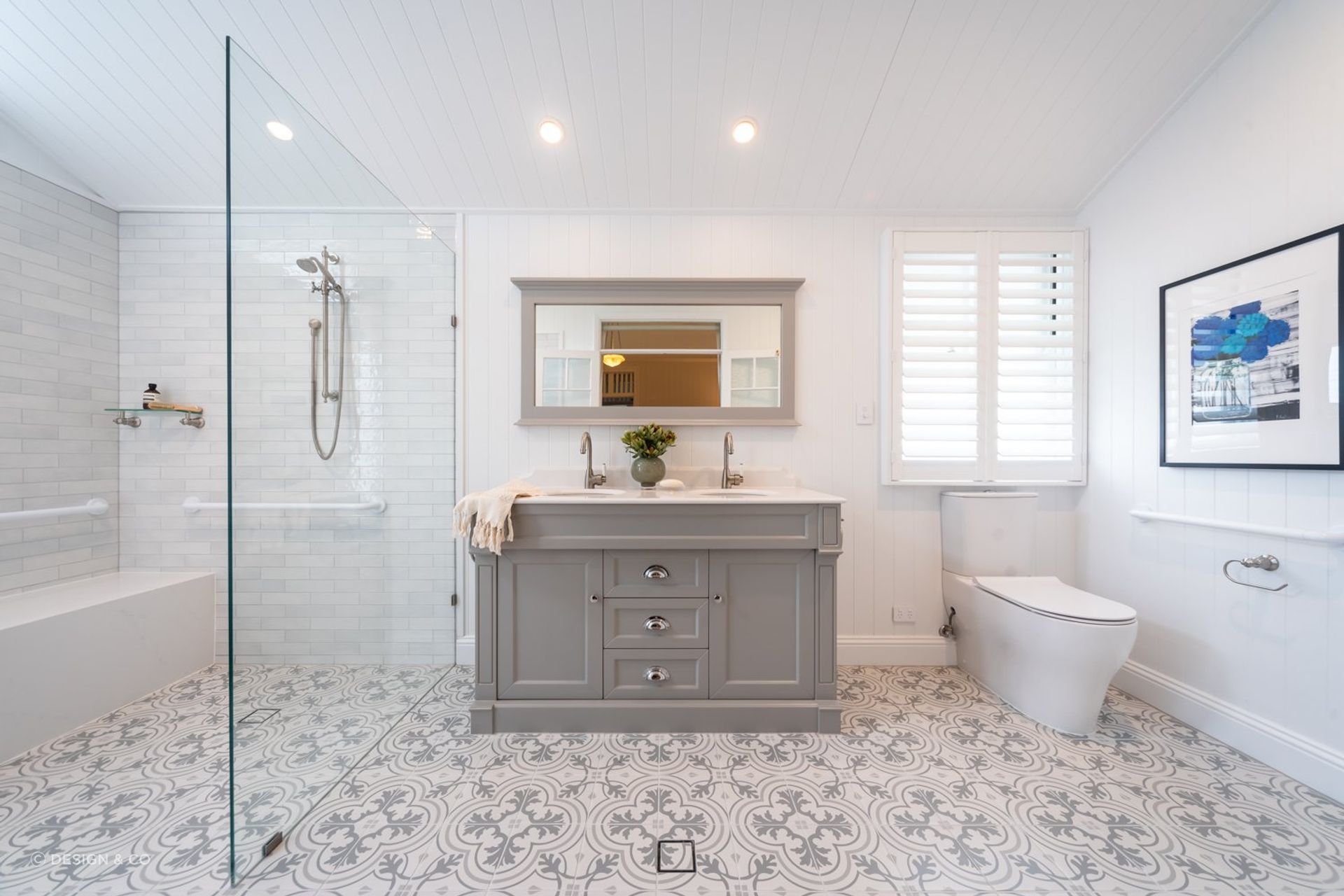 Strategically placing downlights near a special bathroom feature will help it stand out