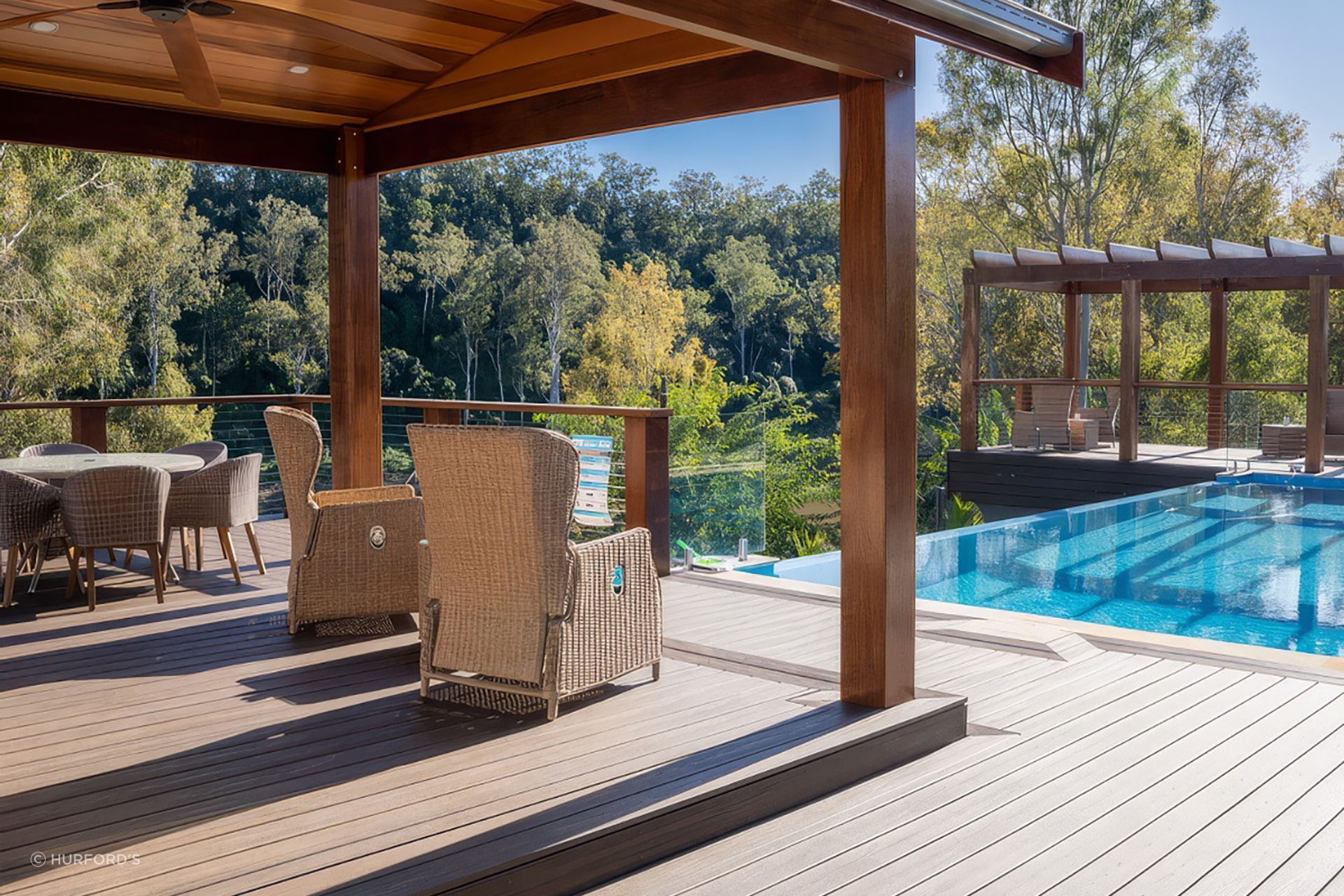 Incorporating a swimming pool into your design results in luxurious living, especially when complemented by a quality product like Trex® Decking By Hurford's.