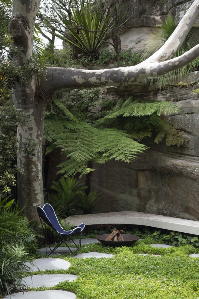 The custom seating is perfectly designed to integrate with the rockface.