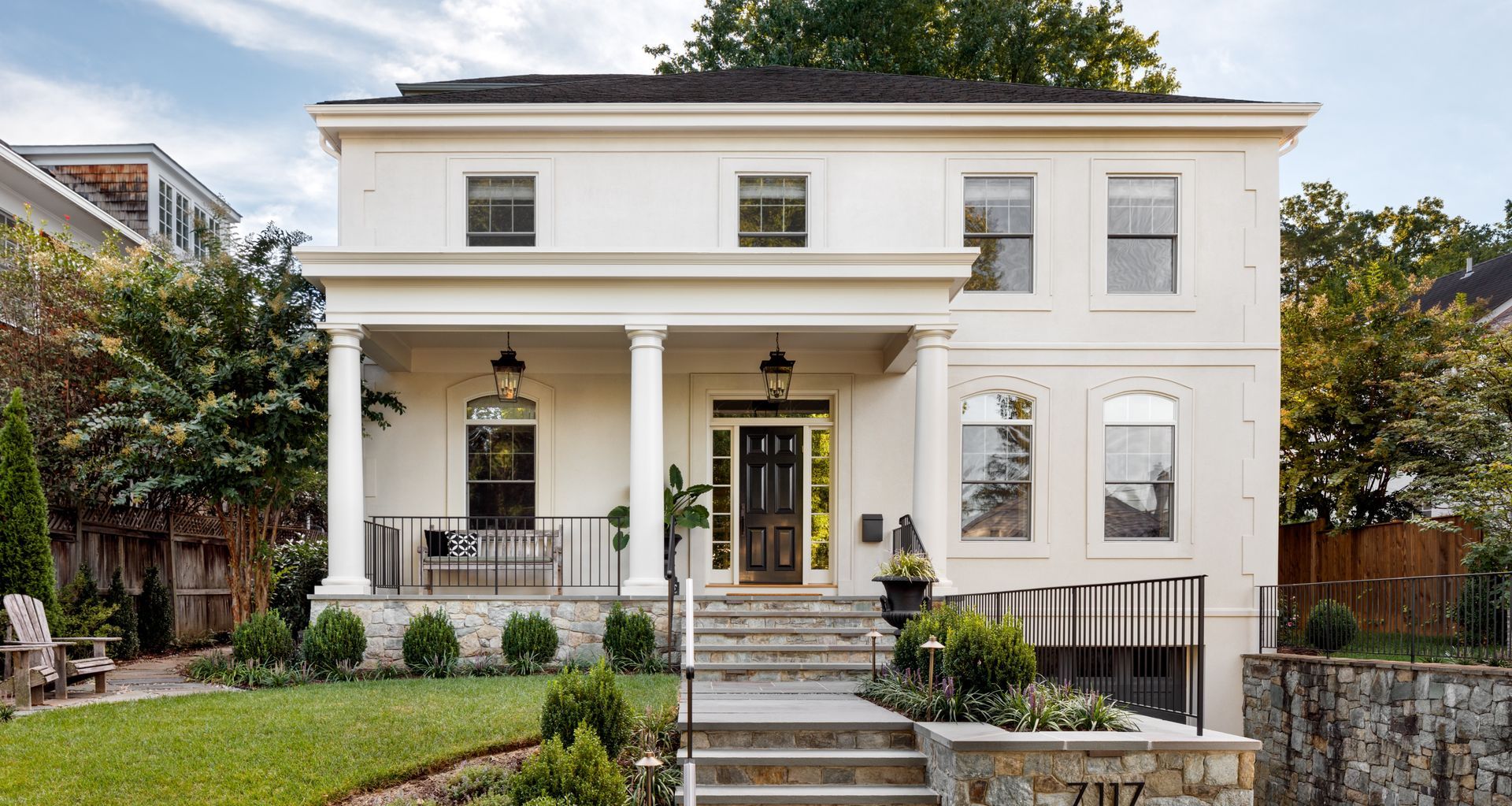 Hill & Hurtt Architects added a transformational front porch and reduced the driveway of their Bethesda, Maryland, project, providing the front elevation and garden with scale and focus. (Photo by Jennifer Hughes)