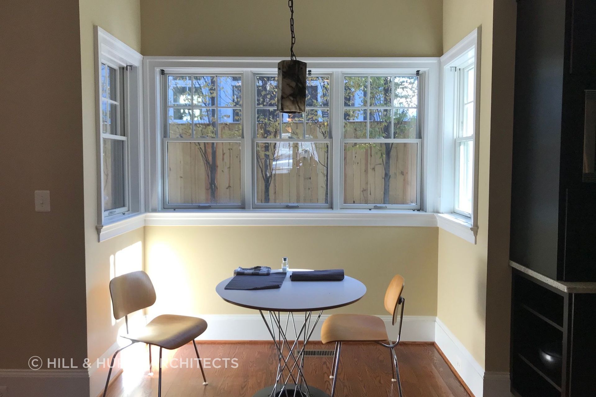 Before: the home's breakfast bay with small, high-silled windows.
