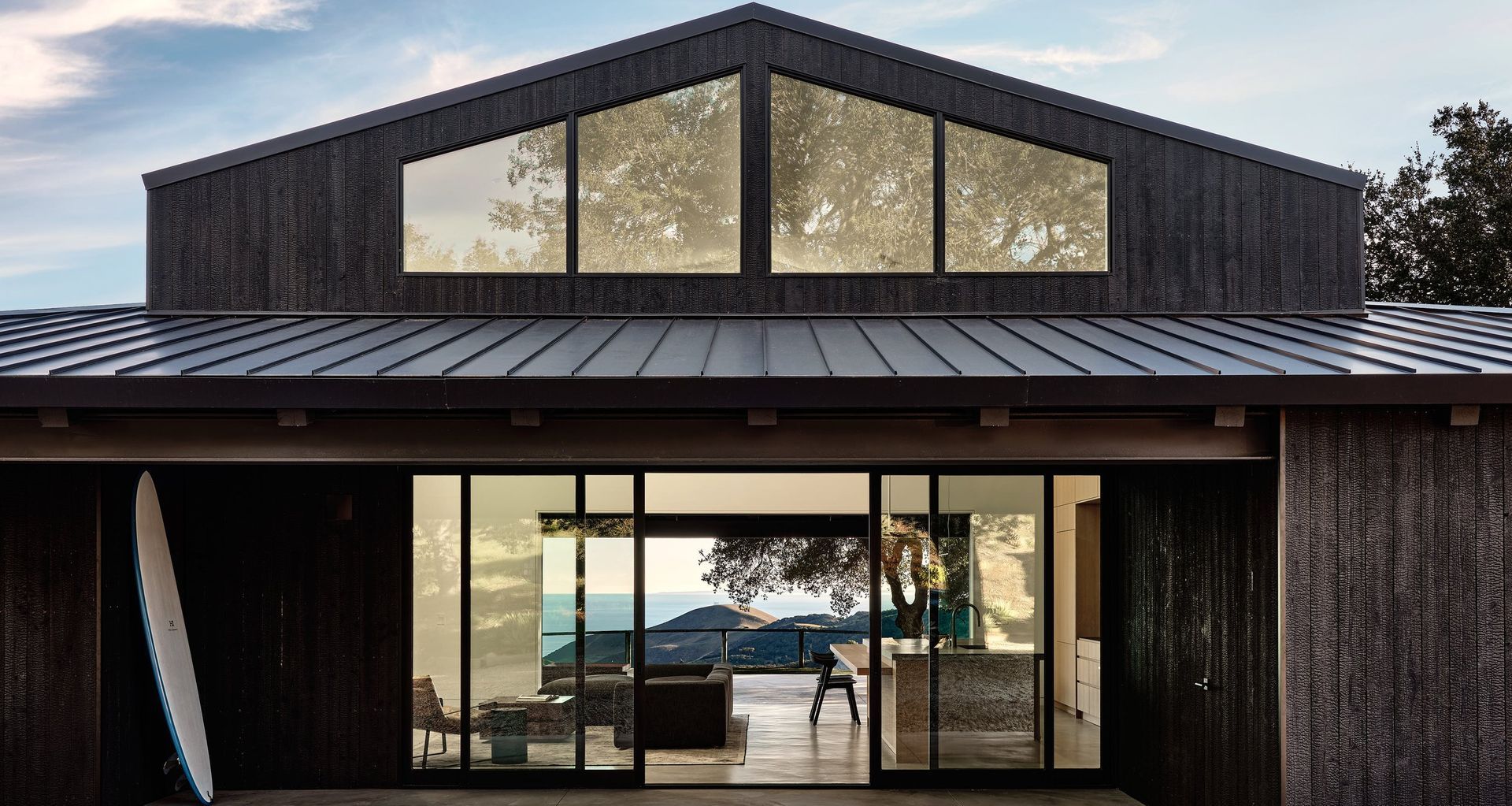 The Black Shack by a34studio pairs shou sugi ban charred cypress with expansive glazing, opening the former ranch house to its Gaviota Coast setting. Photography by Read McKendree.