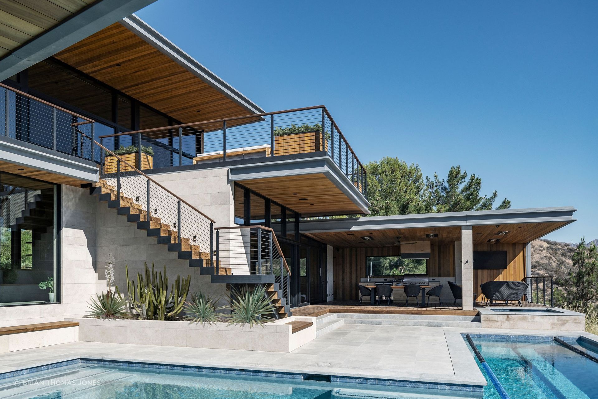 The outdoor terrace, more than a thousand square feet under cover, functions as the family’s real dining room.