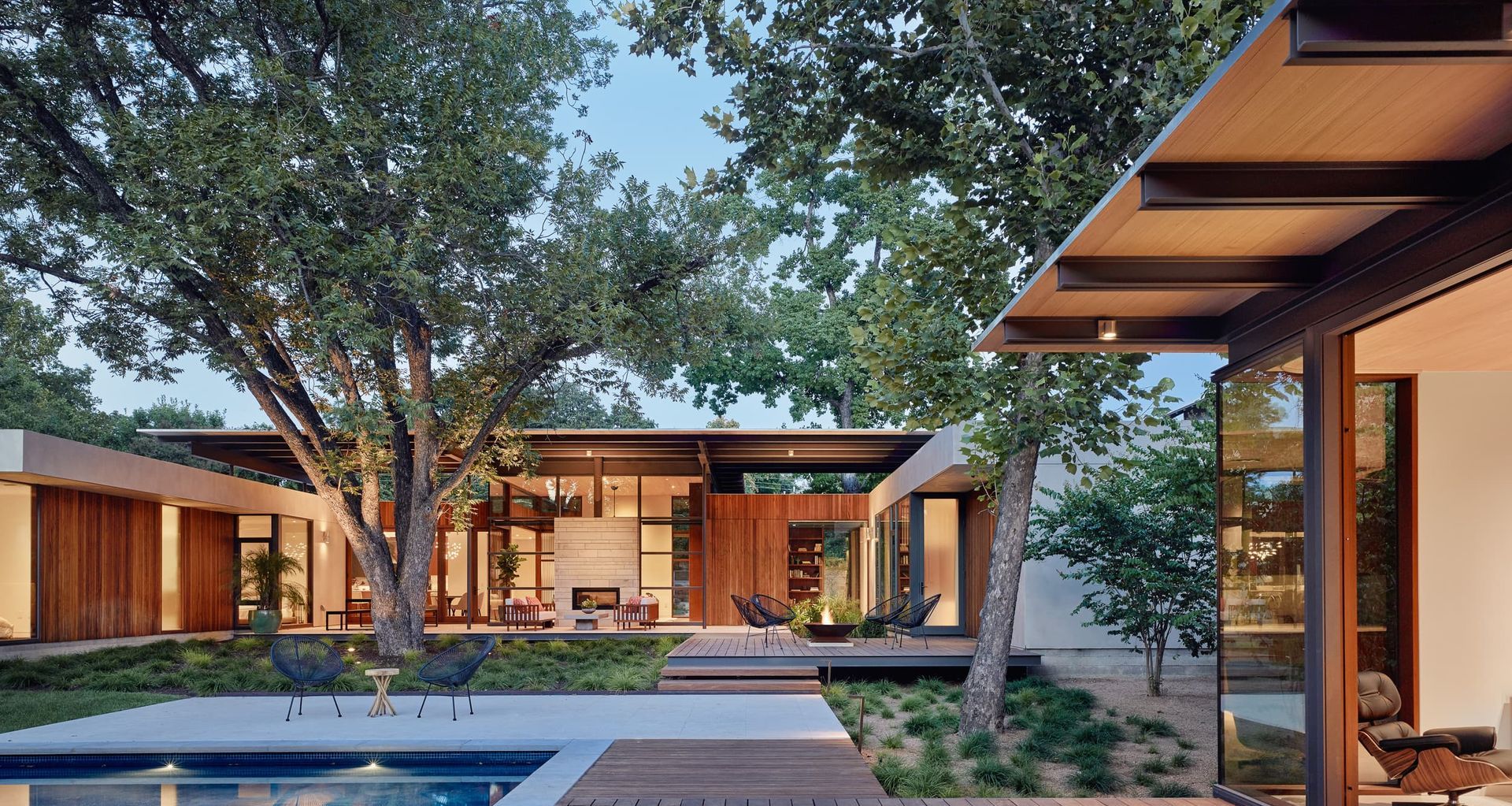 For A Parallel Architecture's Canopy House, the home’s roof canopy and overhangs are configured to take advantage of optimal solar orientation and prevailing breezes, while the building footprint is carefully threaded between the towering oak and pecan trees to maximize beneficial seasonal shading. Photo by Casey Dunn.
