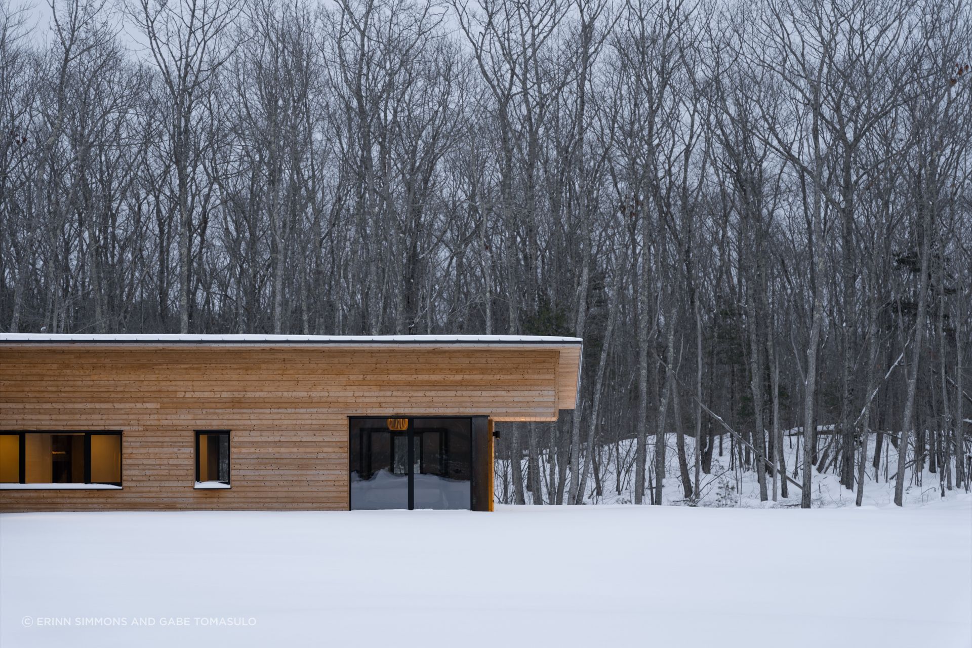Bedrooms (above) are placed to the east and gathering spaces to the west so the pattern of living follows the sun’s path.