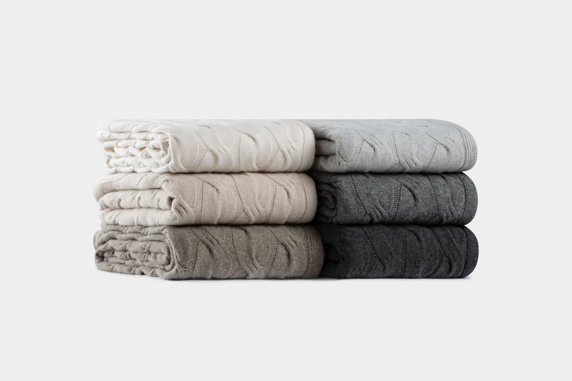 Pure Italian cashmere throw in a chunky cable knit by Bemboka
