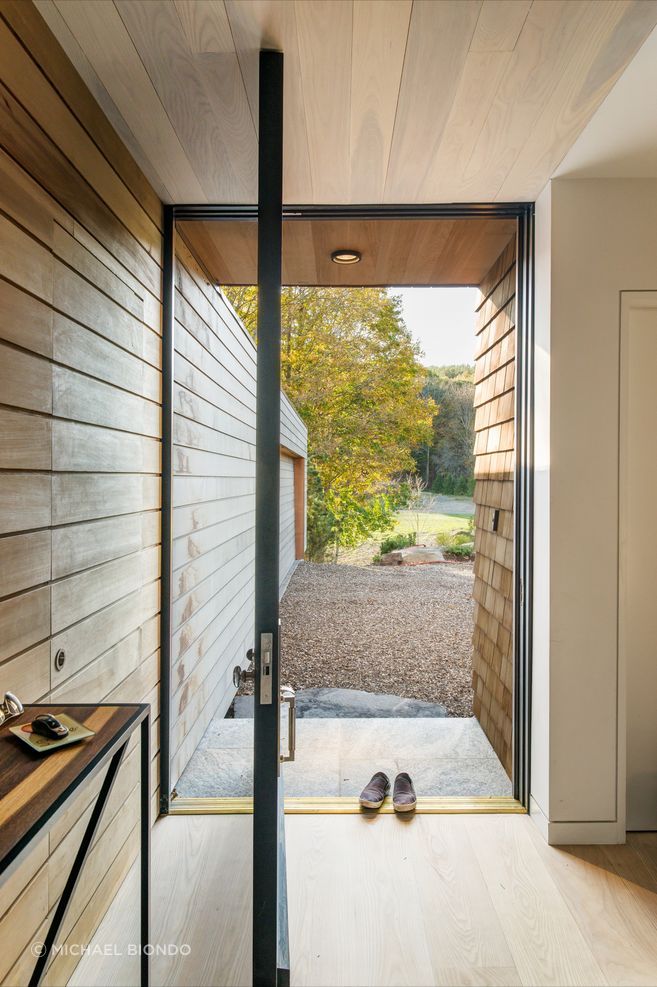 The main house's entry from the side door near the garage.
