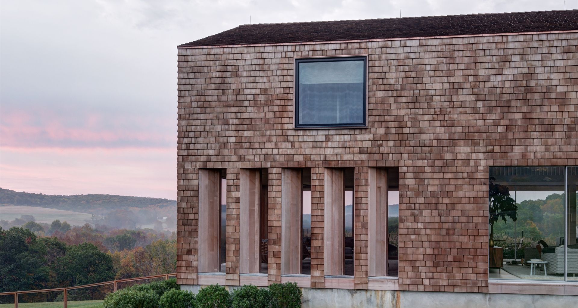 Designed to fit the site’s landscape and blend with the local architectural vernacular, three structures on a 75 acre lot in Columbia County, New York, resolve contradictions to provide a home for a young family of four.