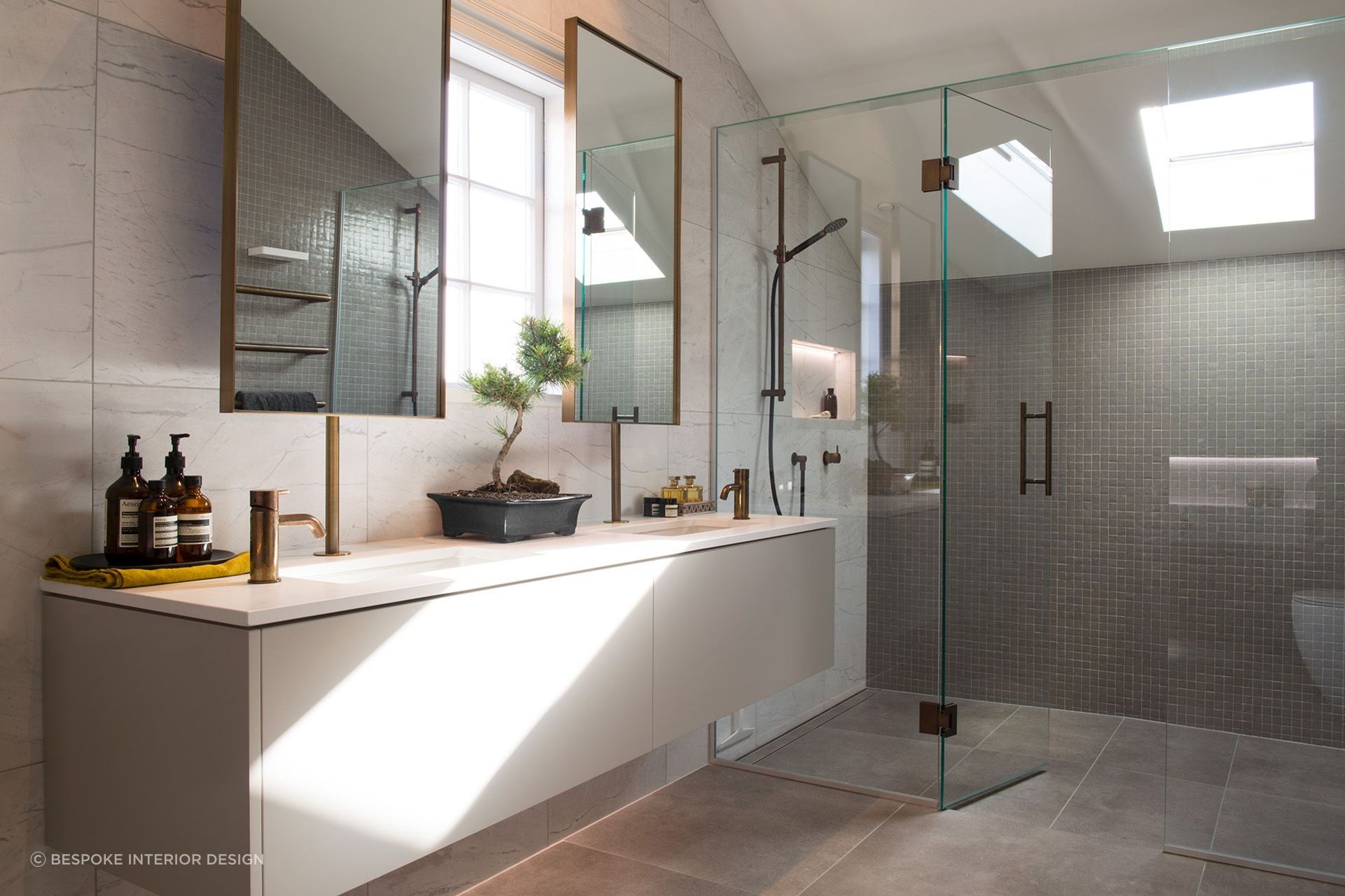 It's hard to beat the look and feel of a high-quality bathroom renovation as seen here at Rangitoto House in Remuera