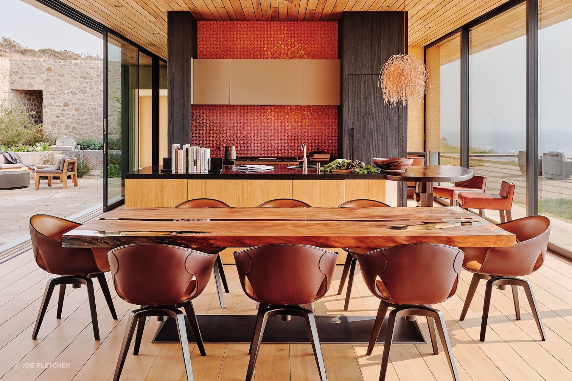 Mal Paso Residence (photo above and below): Floor-to-ceiling glass windows line both the East and West walls, flooding the home with fresh air and morning light and offering an unobstructed view of the ocean.