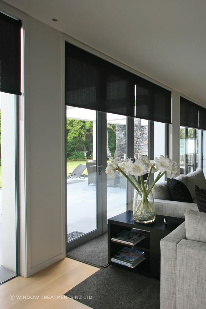 Sunscreen roller blinds are both sleek and functional.