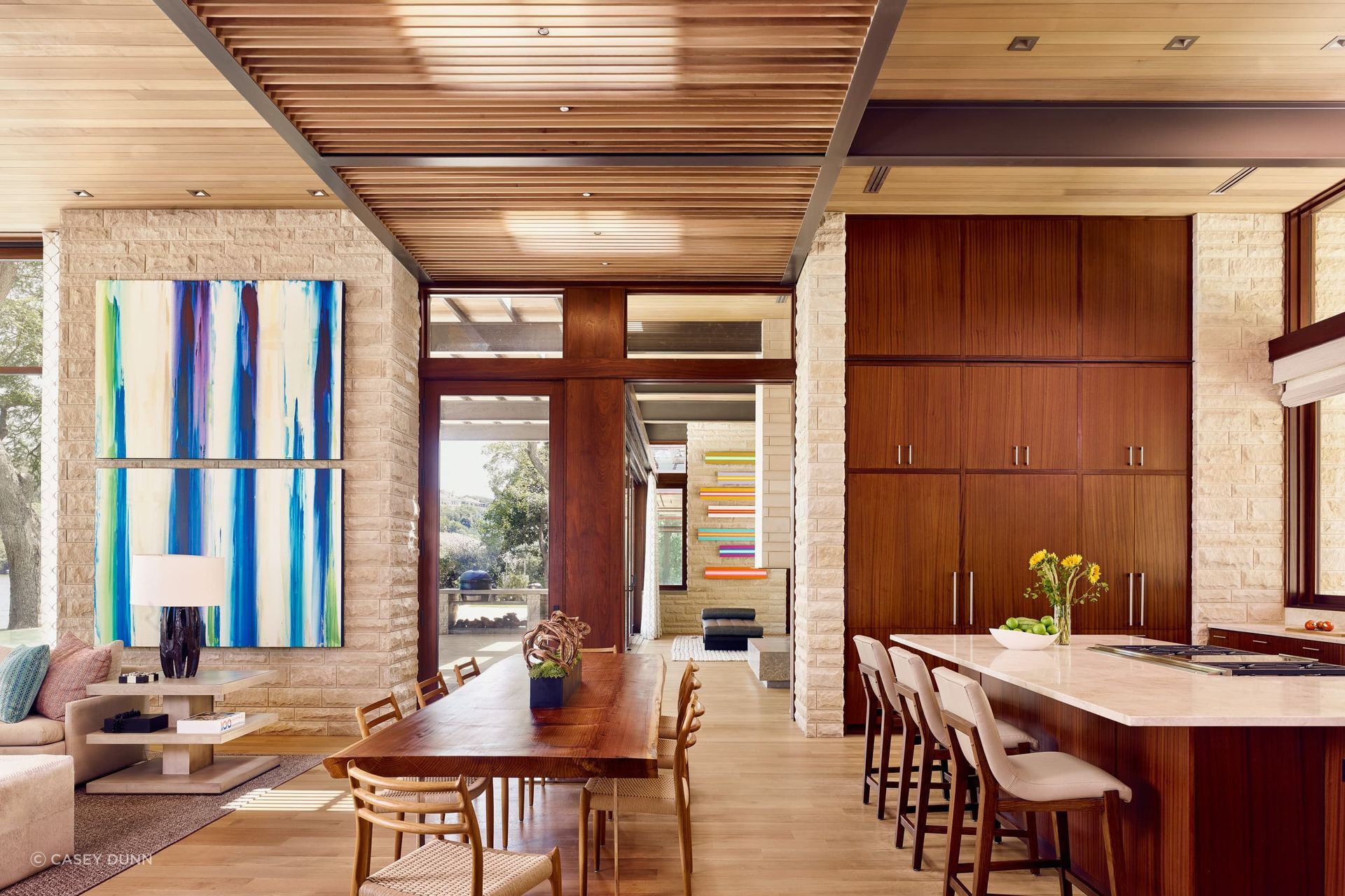 In the Lake Austin home, a warm interior palette of oak, mahogany and cedar serve as a soft counterpoint to the glass and stone, exuding a relaxed livability paramount to the homeowner.