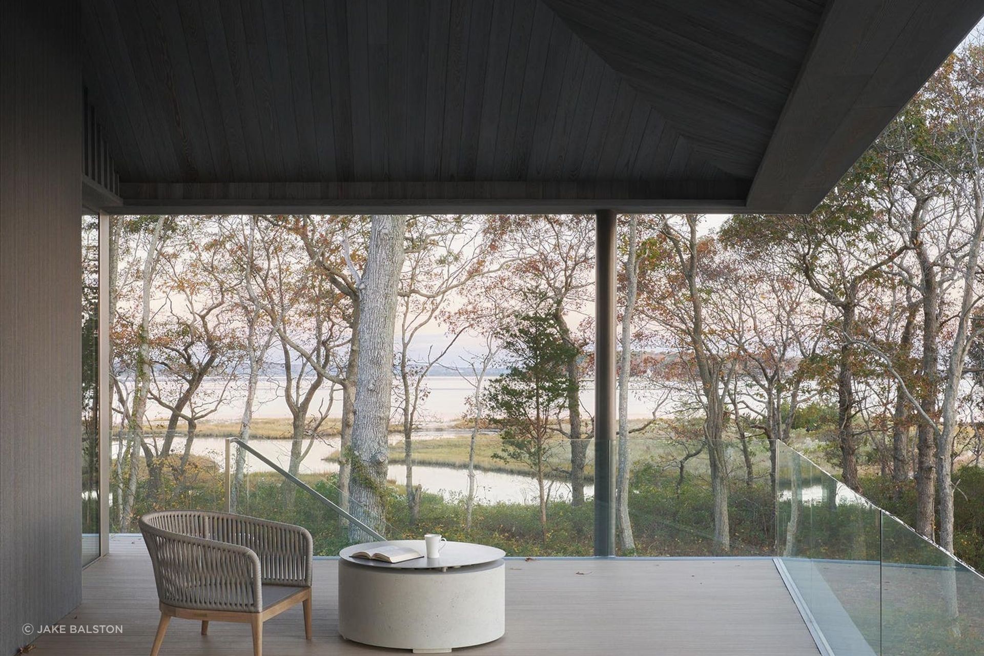 The terrace off the second-floor living room offers a covered perch, where one can observe the biodiversity of the nature preserve.