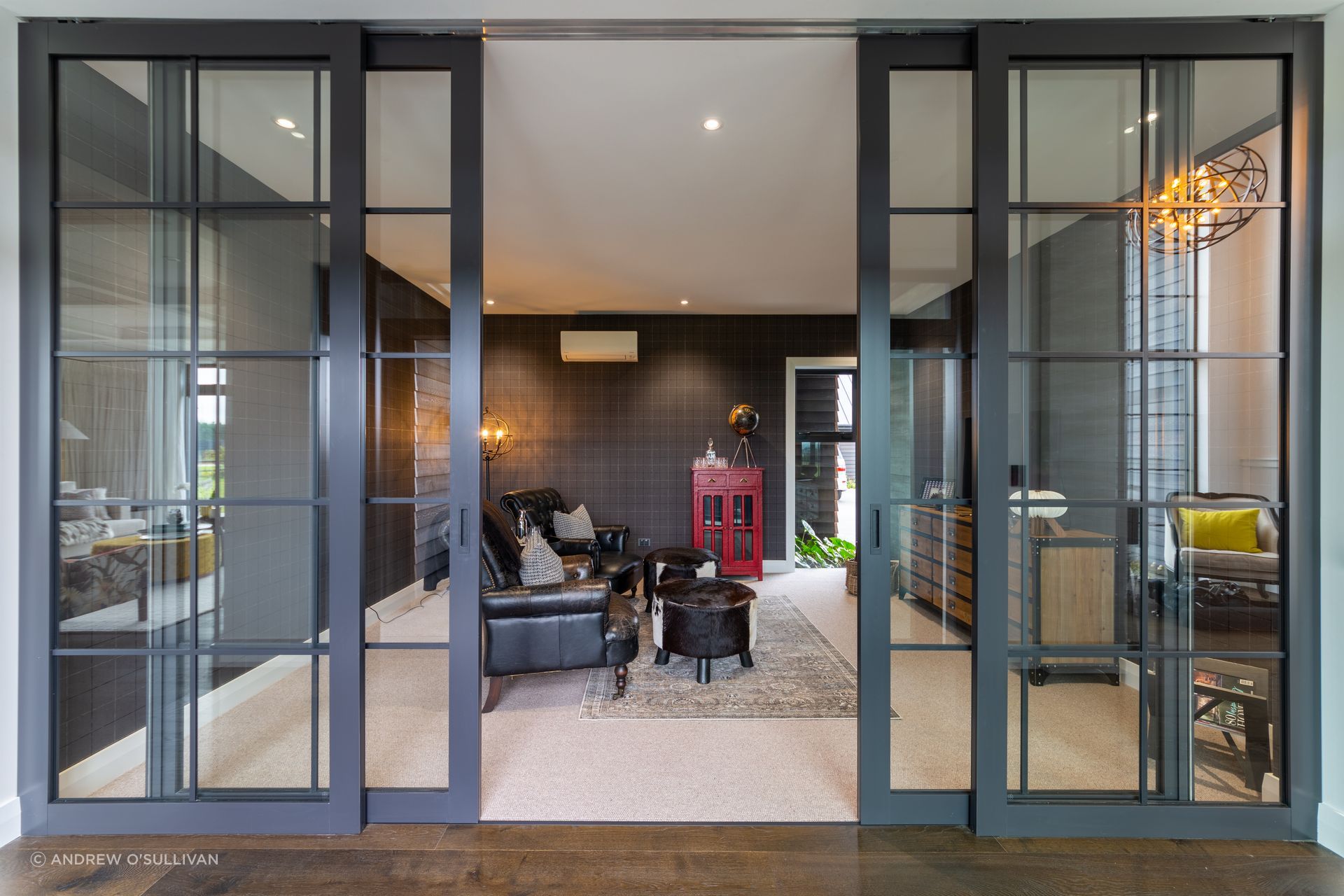 Chamlang are members of the Resene EcoDecorator family.  Resene Half Alabaster in various sheen levels was used throughout the interior of this large home.