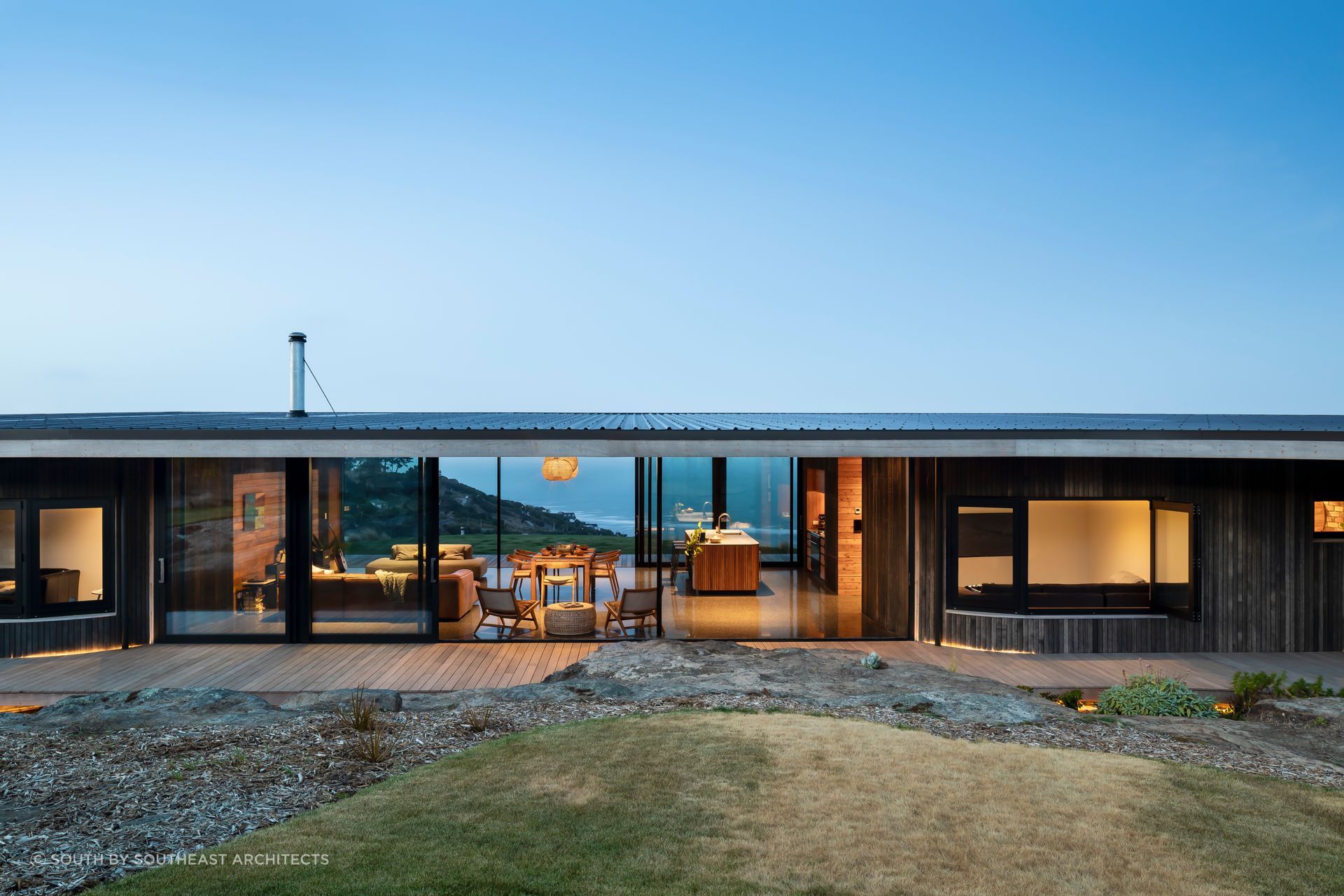 This Port Hills home was amazingly built over the existing volcanic rock formations - Photography: Sarah Rowlands