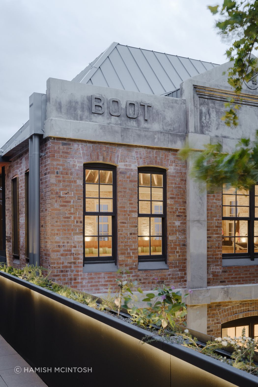 External brick façade retained in Boot Factory restoration while ASH's mass timber was used throughout the internal structural restoration. Image: Hamish McIntosh