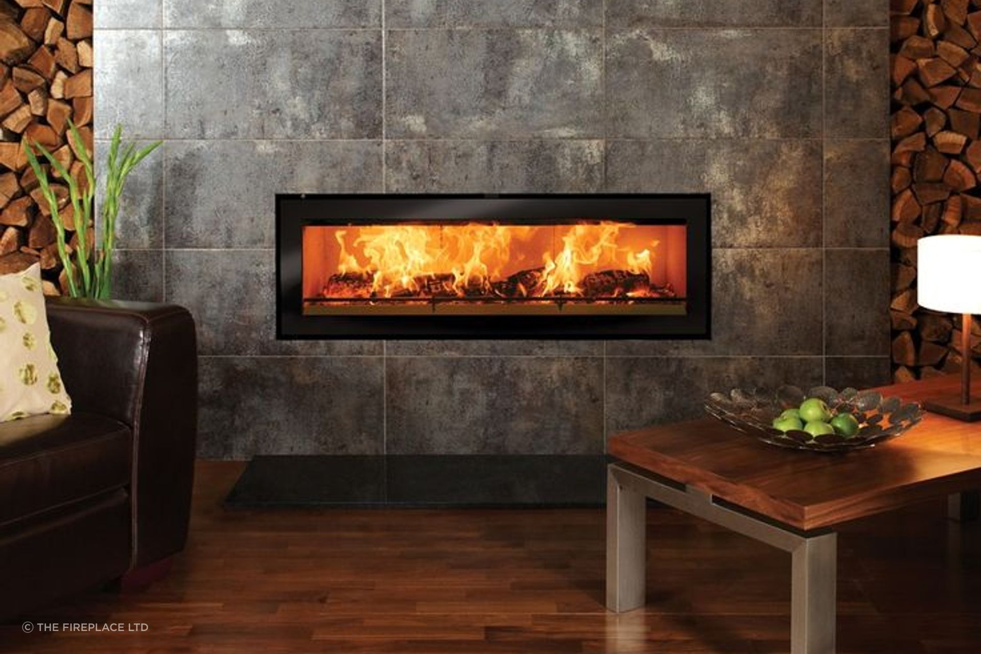 The Studio 3 provides a panoramic view of the shimmering flames and glowing logs.