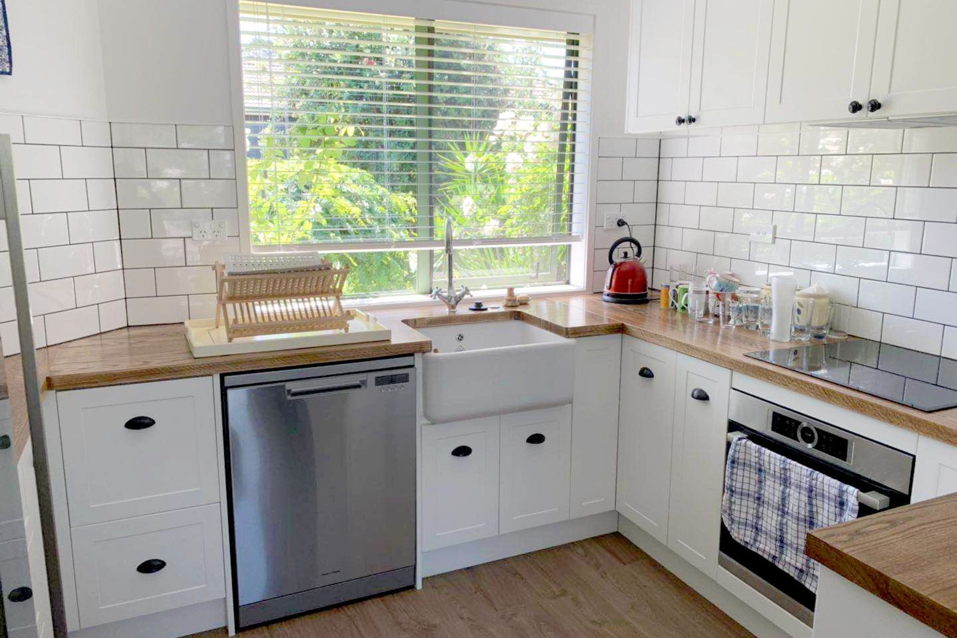 A classic butler’s sink installed which is one of the hallmarks of a cottage style kitchen
