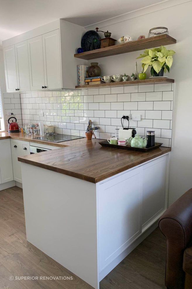 Kitchen renovation in South Auckland: Floating open shelves were added  to increase storage and add a design element to the kitchen.